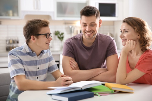 College prospect with his parents